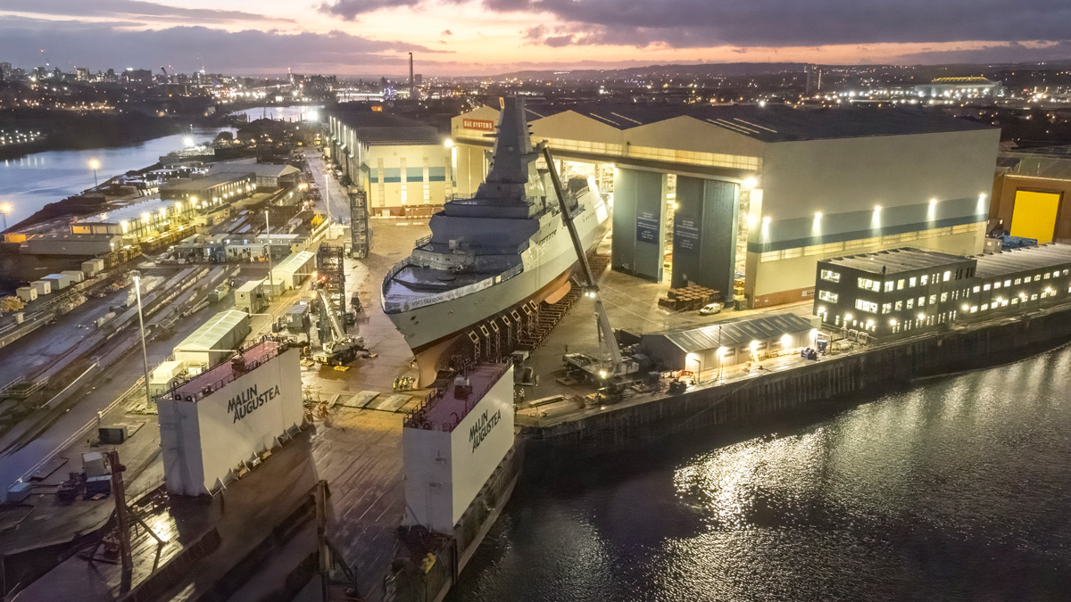 HMS Glasgow out load onto barge